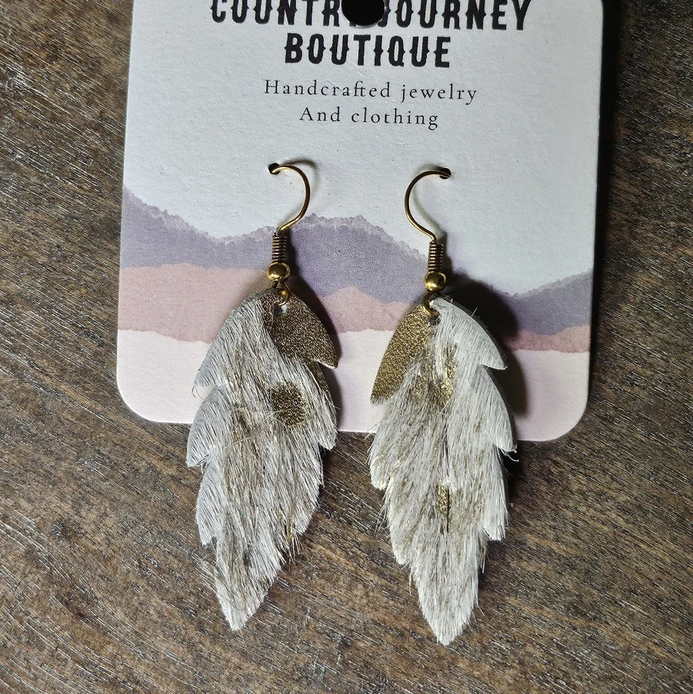 NWT Gold and Cream Leather Feather Earrings
